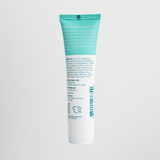 Best fluoride-free whitening toothpaste back view showing natural ingredients and product details on a Wellnesse mint-flavored tube.