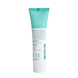 Natural whitening toothpaste back label showing ingredients and usage instructions on a Wellnesse tube with a teal and white design.