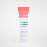 Strawberry fluoride free toothpaste for sensitive teeth in a children's Wellnesse tube with clean design on white background