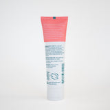 Strawberry fluoride free toothpaste for sensitive teeth with hydroxyapatite and soothing aloe, showing ingredients and benefits on tube back