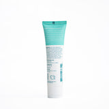 Fluoride free toothpaste for sensitive teeth with hydroxyapatite and soothing aloe, shown with ingredient list on mint-green Wellnesse tube.