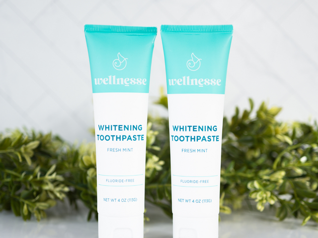 Best non toxic whitening toothpaste options from Wellnesse, including fresh mint, charcoal mint, and children's strawberry fluoride-free formulas.