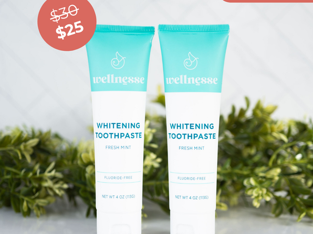 Whitening mint toothpaste by Wellnesse, fluoride-free and displayed in a discounted twin pack with a "Save 17%" label.