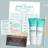 Fluoride-free mint whitening toothpaste by Wellnesse shown with toothbrush, habit tracker, and smile shade guide for progress monitoring