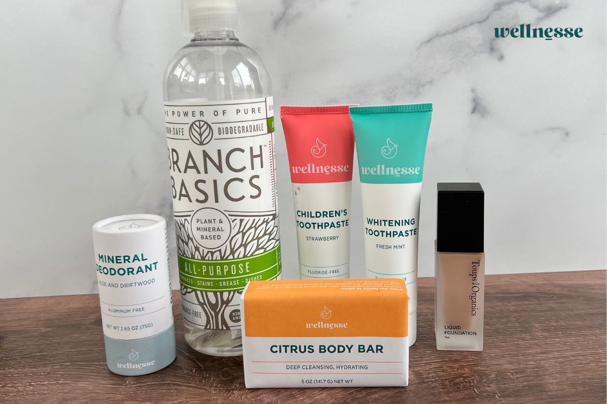 Natural bathroom swaps including mineral deodorant, all-purpose cleaner, fluoride-free toothpastes, citrus body bar, and.