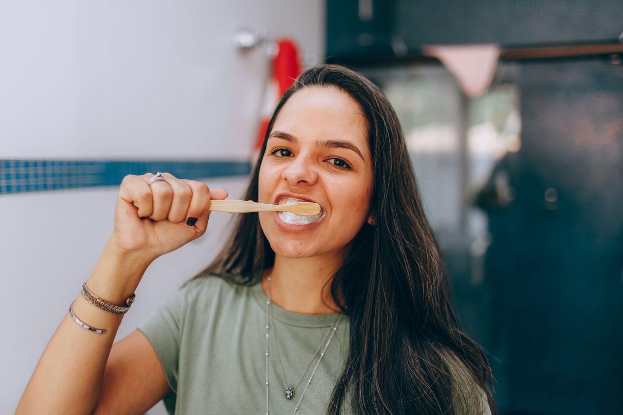 Woman brushing her teeth