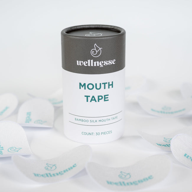 Silk mouth tape by Wellnesse made from soft bamboo silk, shown in a 30-piece pack designed for gentle overnight use to support nasal breathing and improve sleep quality.