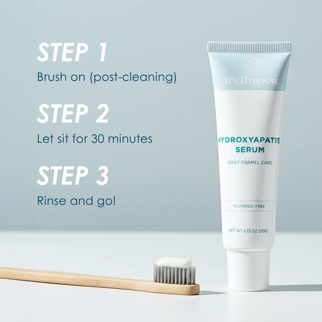 Wellnesse Hydroxyapatite Serum fluoride-free tube with three-step usage instructions and a bamboo toothbrush.