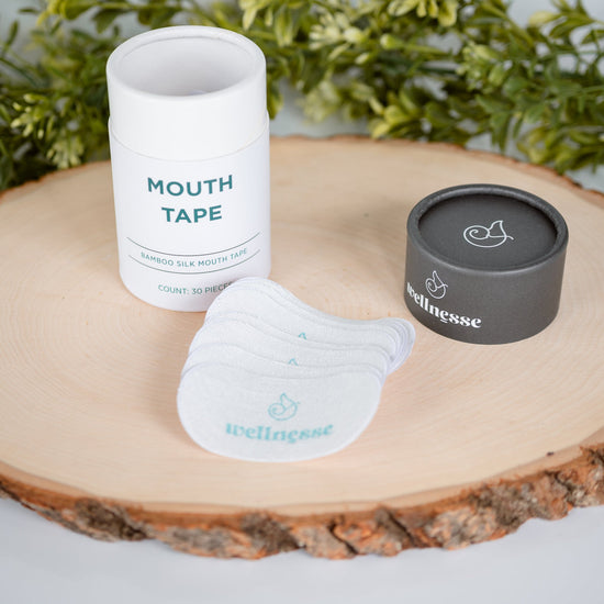 Bamboo mouth tape by Wellnesse shown in a 30-piece set, made from soft bamboo silk for comfortable overnight wear to promote nasal breathing and better sleep.