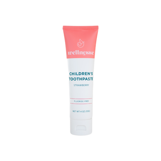 Strawberry chemical free toothpaste for children in a Wellnesse fluoride-free formula, isolated on a transparent background.