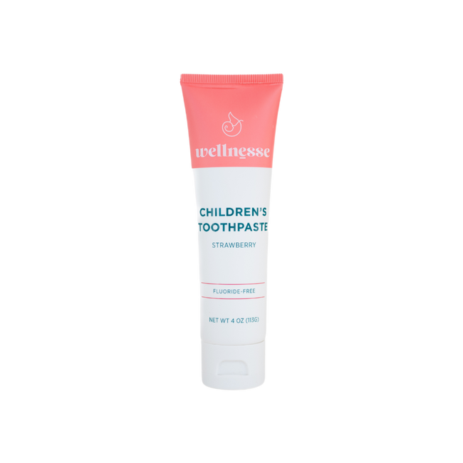 Strawberry chemical free toothpaste for children in a Wellnesse fluoride-free formula, isolated on a transparent background.