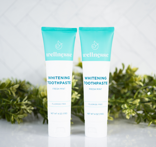 Best non toxic whitening toothpaste options from Wellnesse, including fresh mint, charcoal mint, and children's strawberry fluoride-free formulas.