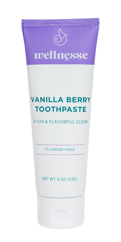 Tube of Vanilla Berry Toothpaste with purple cap on a white background