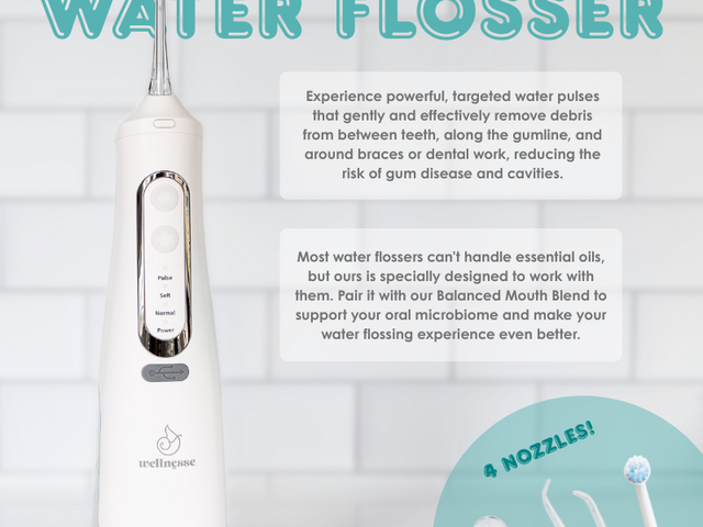 Water flosser by Wellnesse with 4 nozzles, designed for use with essential oils to support oral health.
