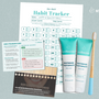 Whitening mint toothpaste by Wellnesse shown with a bamboo toothbrush, habit tracker, and smile shade guide.